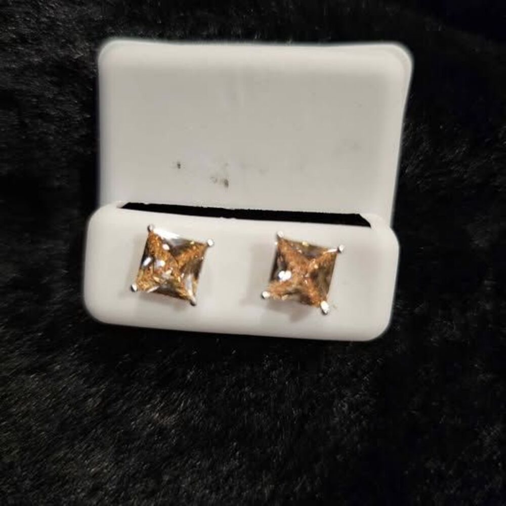 2.5CTW Princess cut CZ's earrings in sterling silver.